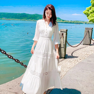 白色仙女连衣裙夏遮肚显瘦丽江服饰旅游拍照海边度假沙滩裙长裙女