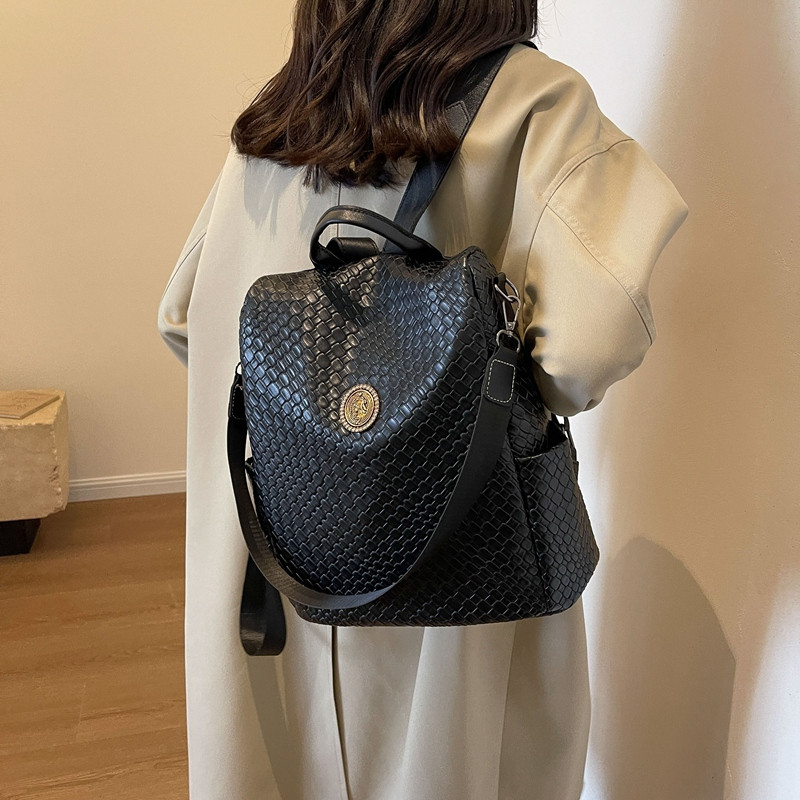 高级感防盗双肩包2023新款韩版通勤女包大容量旅游包编织软皮背包