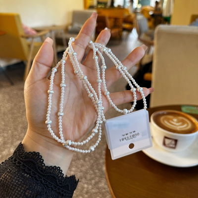 欧比雅比气质百搭温柔法式高级感轻奢仿珍珠项链长链毛衣链25260