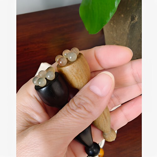 小红书  紫光檀眼部小莲蓬按摩梳绿檀木羊角珠眼部按摩朱雀三啄棒