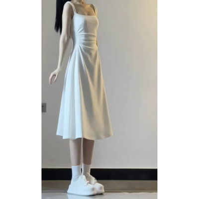 白色吊带洋装子女夏季2025新款小个子法式茶歇海边度假收腰长裙