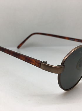 Fossil 棕色合金小椭圆款太阳镜男女通用墨镜