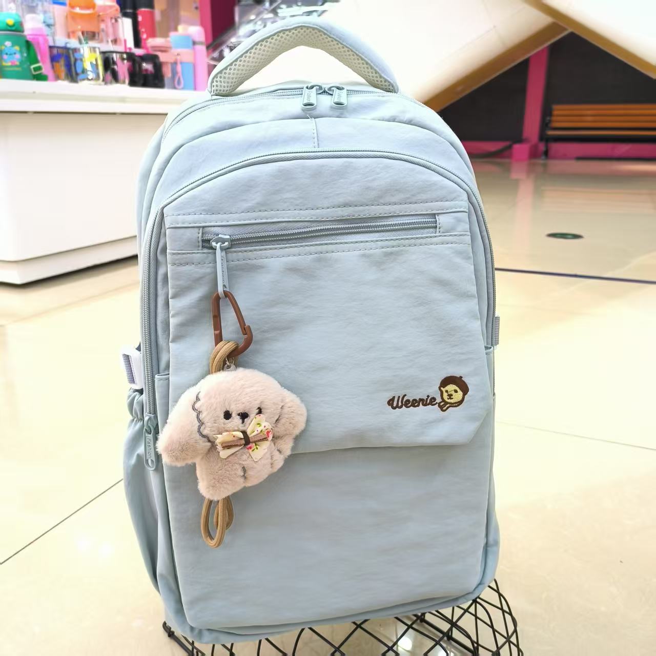简约ins风全新卡通挂件双肩包女学生大容量书吧外出旅行背包图片