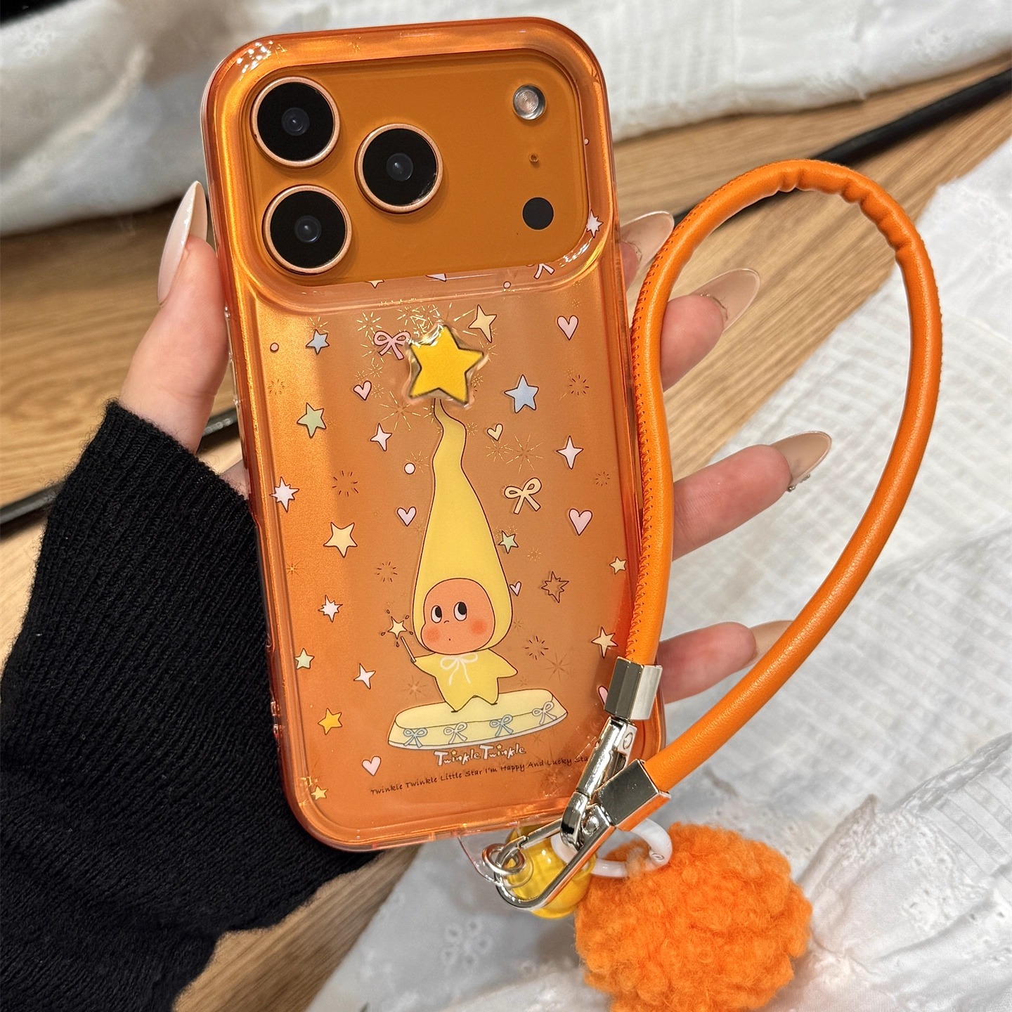 星宇橙色油画尖帽星星男孩毛球手拎绳适用于iphone17promax苹果14手机壳15新款16pro女13立体17pm硅胶防摔套