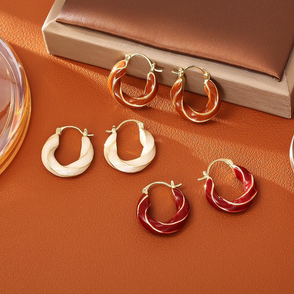 爆款经典港风扭曲滴油耳环复古时尚高级感小众设计耳饰女简约耳扣