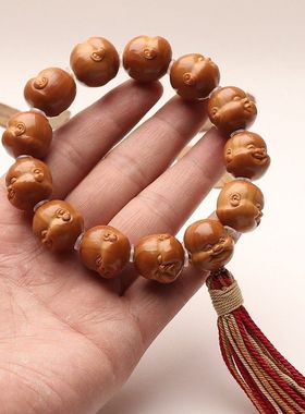 短圆铁核手工雕刻橄榄核三通款十分开心百态手持把件文玩淘气弥勒