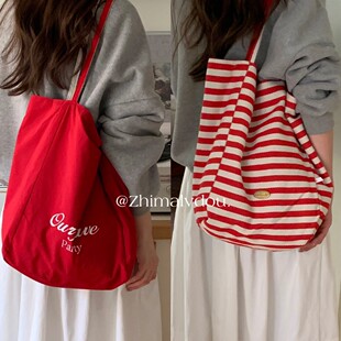 双面可背条纹帆布包小众韩版大容量慵懒风红色托特包休闲购物袋女