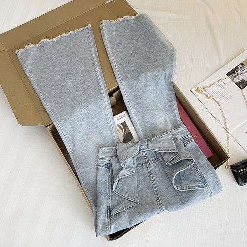 实拍设计感蝴蝶结韩系纯欲翘臀高腰弹力修身显瘦微喇叭牛仔裤子女