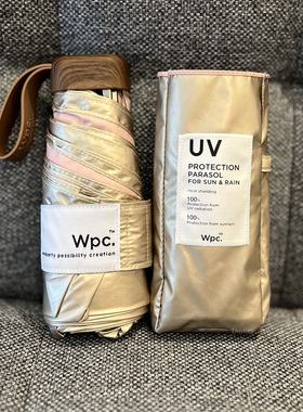 日本wpc伞遮阳防晒晴雨两用防紫外线五折超轻金色彩胶迷你太阳upf