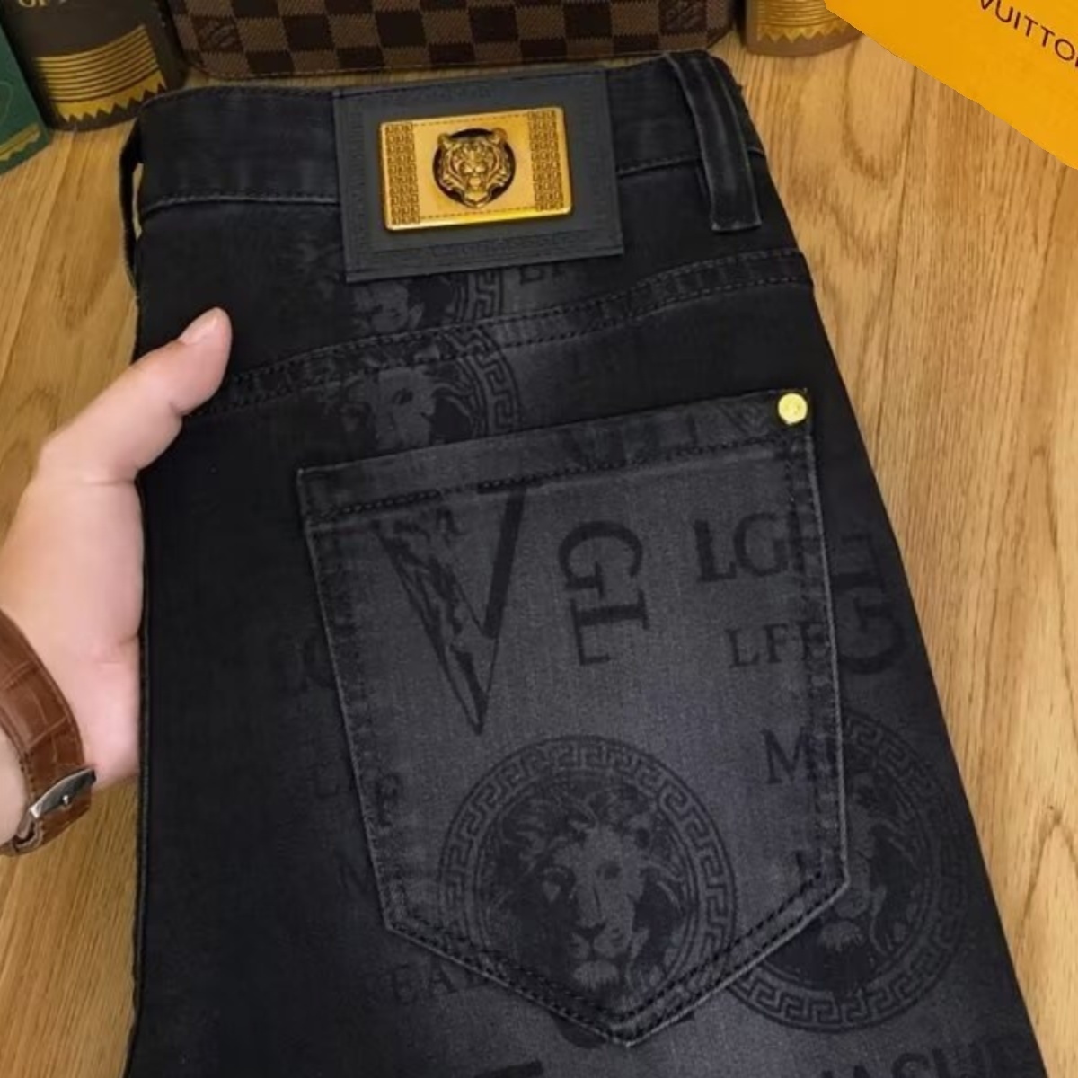 欧货高端潮牌韩版牛仔裤男士修身小脚裤弹力休闲百搭黑色印花长裤