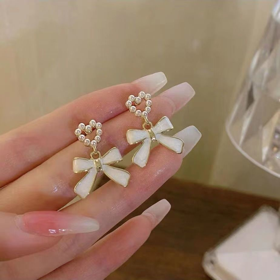 「一船星梦」无耳洞吊坠蝴蝶结蚊香盘耳夹气质耳钉小众设计高级感,饰品/流行首饰/时尚饰品新,耳夹,淘宝优惠券,粉丝福利购,淘宝优惠卷