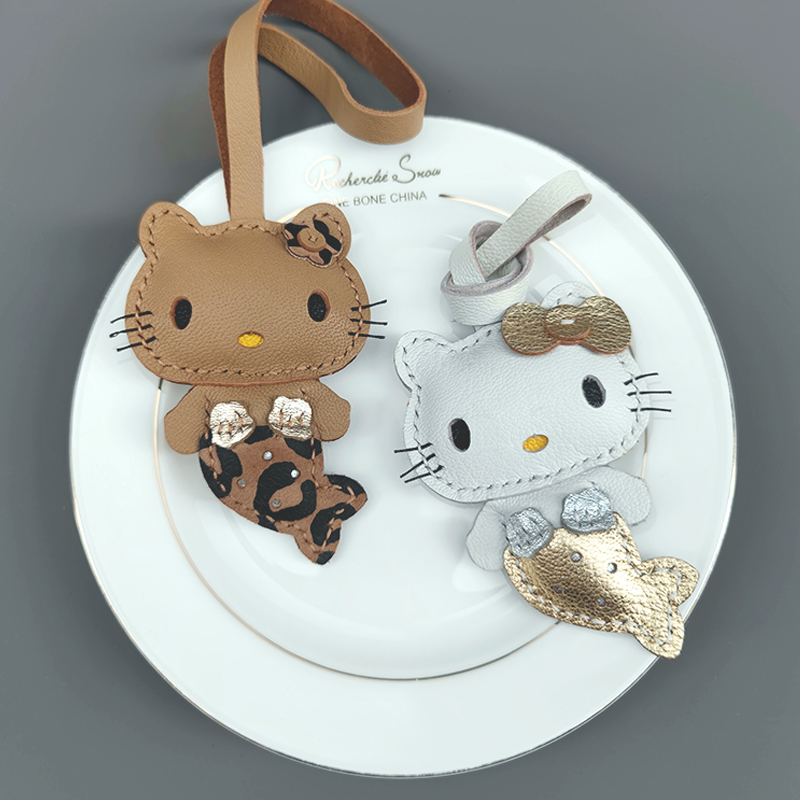 豹纹黑皮美人鱼hellokitty包包挂件钥匙扣可爱真皮女生书包小挂饰