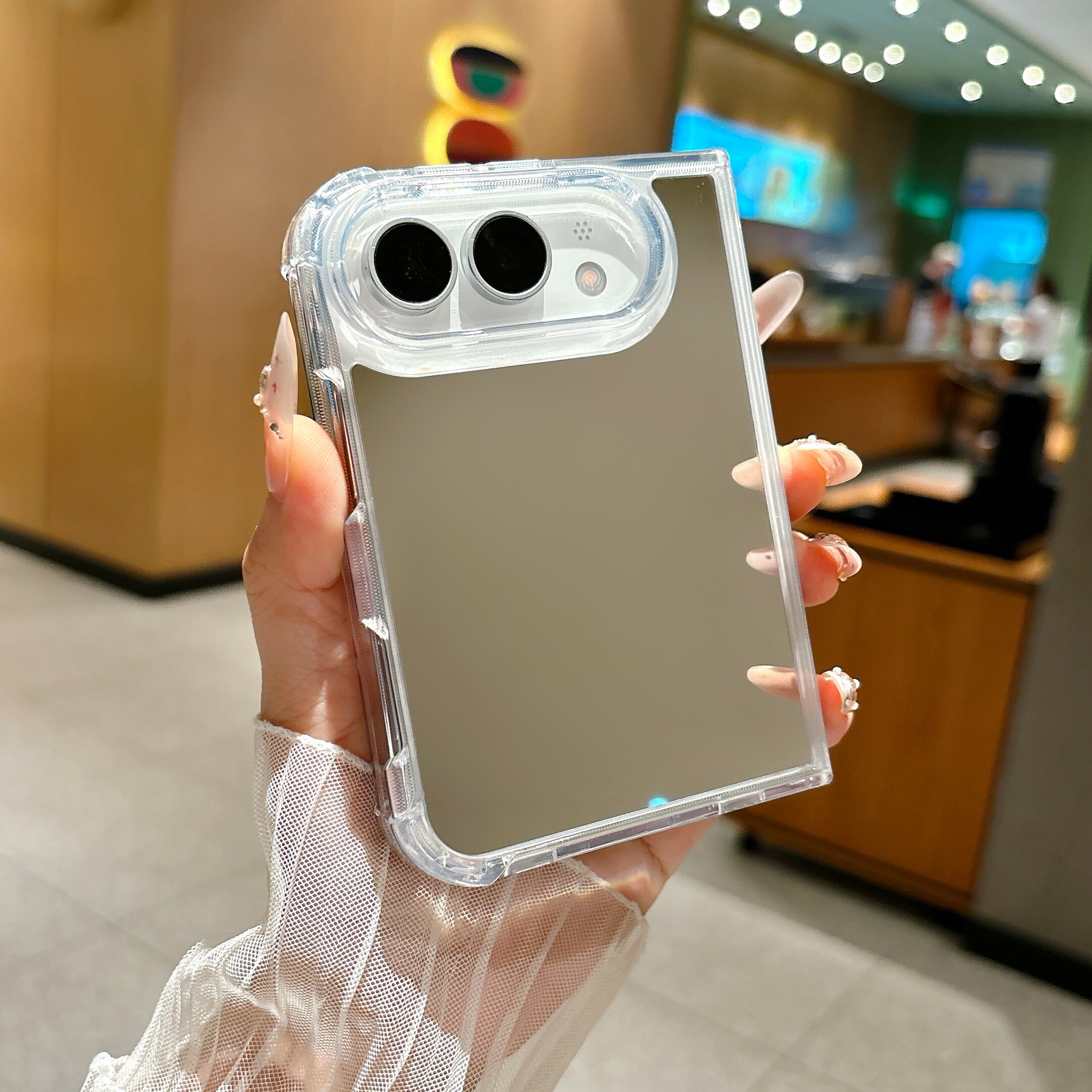 适用于iPhoneDuo气囊防摔镜面壳