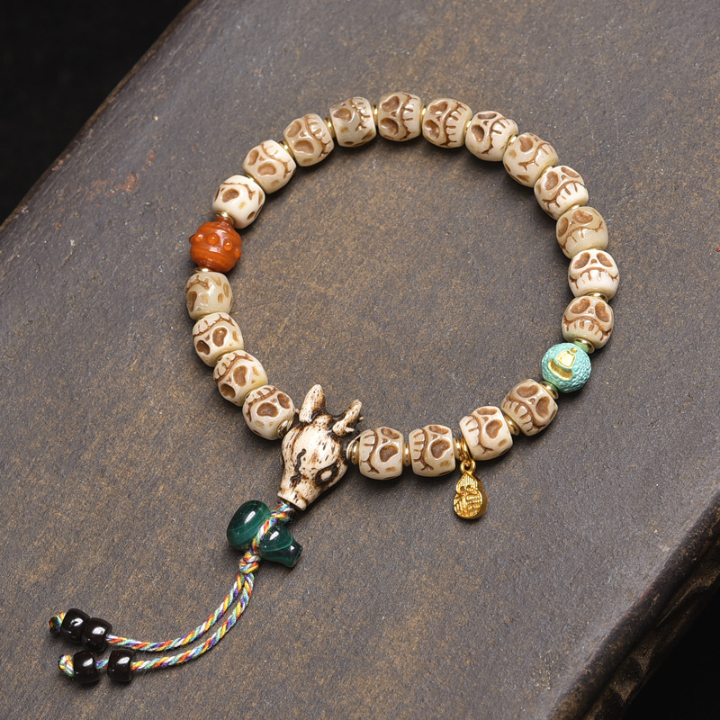藏传回流骨雕刻阿呆文玩手串