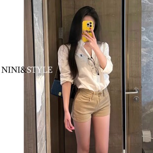 高腰緊身美式 卡其色牛仔短褲 夏季 辣妹包臀顯瘦a字熱褲 女2025新款