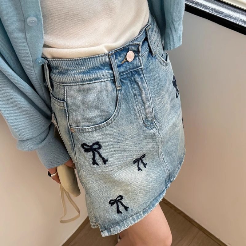 蝴蝶结刺绣牛仔半身裙女欧洲站夏季2026新款欧货女装A字包臀裙潮