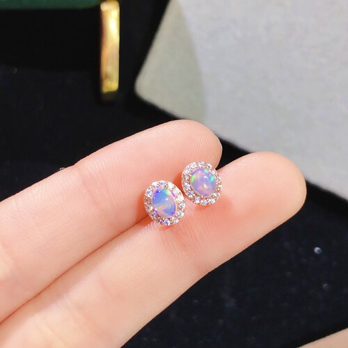 超美欧泊耳钉。主石4*5mm ，925银精工镶嵌