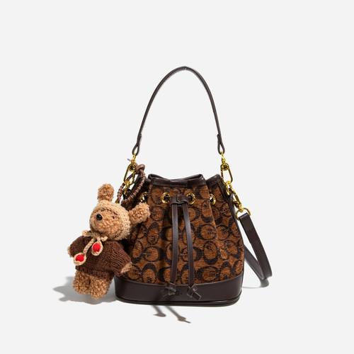 2025新款复古印花女包百搭手提时尚单肩斜挎包水桶秋冬