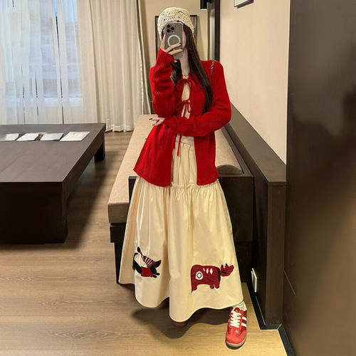 绑带开衫毛衣外套+卡通半身裙