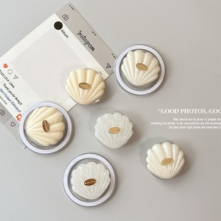 立体闪粉贝壳伸缩式桌面手机气囊支架磁吸适用MagSafe背贴支撑架