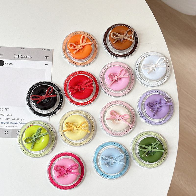 磁吸背贴纽扣纯色蝴蝶结手机气囊支架小众可伸缩桌面支架稳固创意,3C数码配件,手机支架/手机座,淘宝优惠券,粉丝福利购,淘宝优惠卷