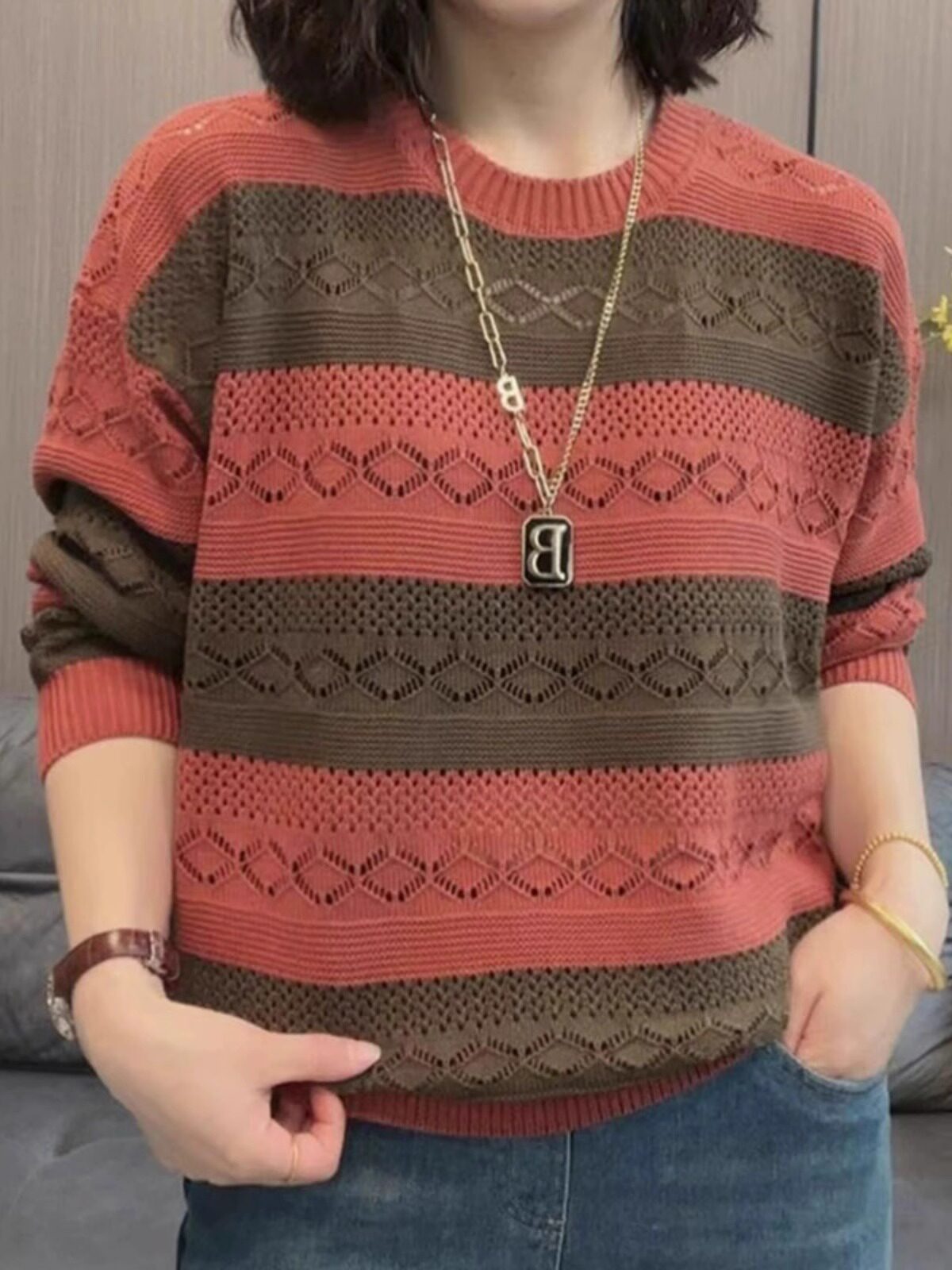 Jacquard contrast knitted sweater 2026 spring and autumn new loose flesh covering versatile hollow women's foreign style age-reducing top trend