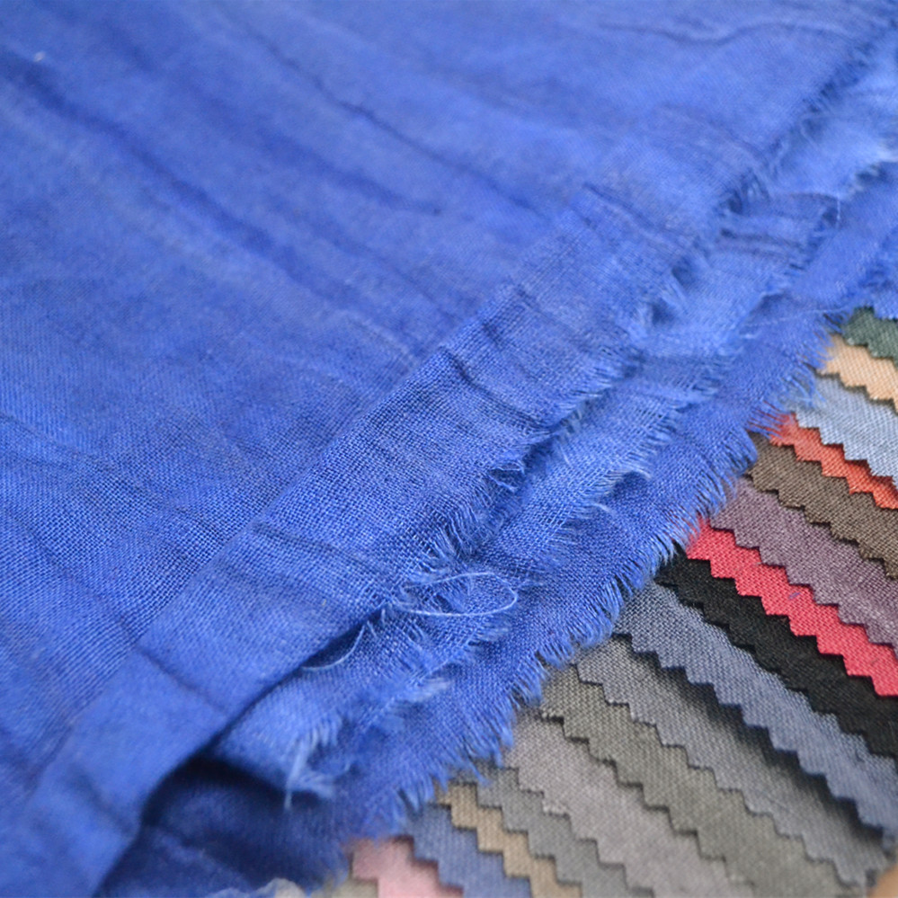 2020旧新款纯亚麻砂洗做年亚麻砂洗面料靛蓝女装面料现货供应