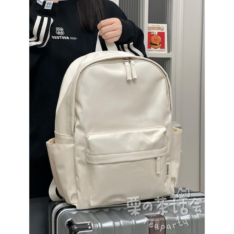 新品日系ins风小众PU皮质书包 高中大学生双肩包女简约百搭旅行背