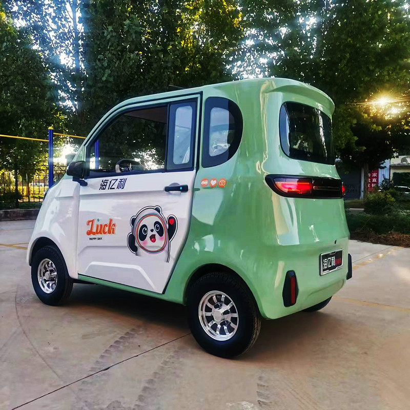 两门迷你电动四轮车全封闭接送孩子小巧电动轿车老年代步车