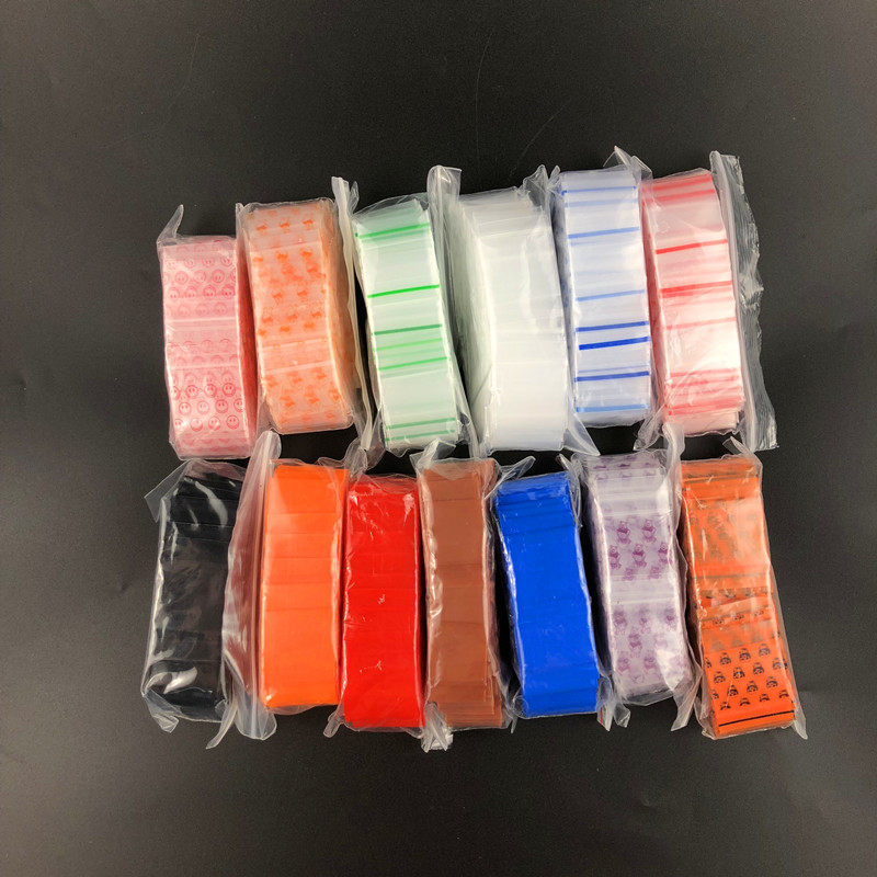 小号有颜色自封袋红色蓝色印花小猪笑脸人头密封袋特小加厚塑料袋
