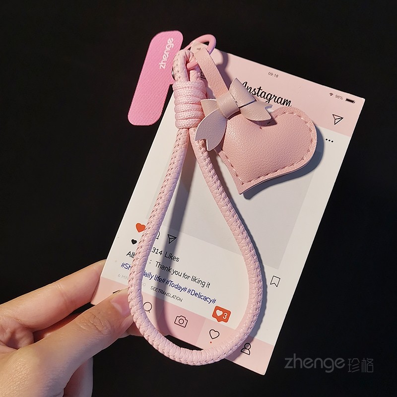 双域手机挂绳皮质爱心蝴蝶结包挂件女手腕短款防丢户外旅游出行防掉手提链带子手机壳电弧套钥匙扣相机手绳新