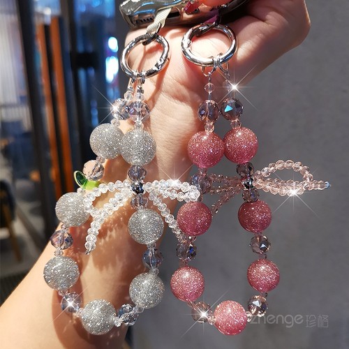 双域星空珠手机链水晶蝴蝶结手机壳串珠挂件女短款时尚高级感手腕挂饰户外旅游出行逛街防丢手提链手机挂绳新