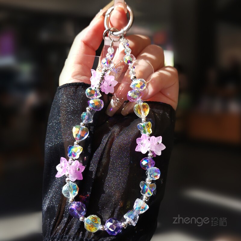 双域绝美水晶铃兰花手机链挂件女士手腕短款布灵串珠小众精致高级感挂钥匙包包手提户外旅游出行手机挂绳新品