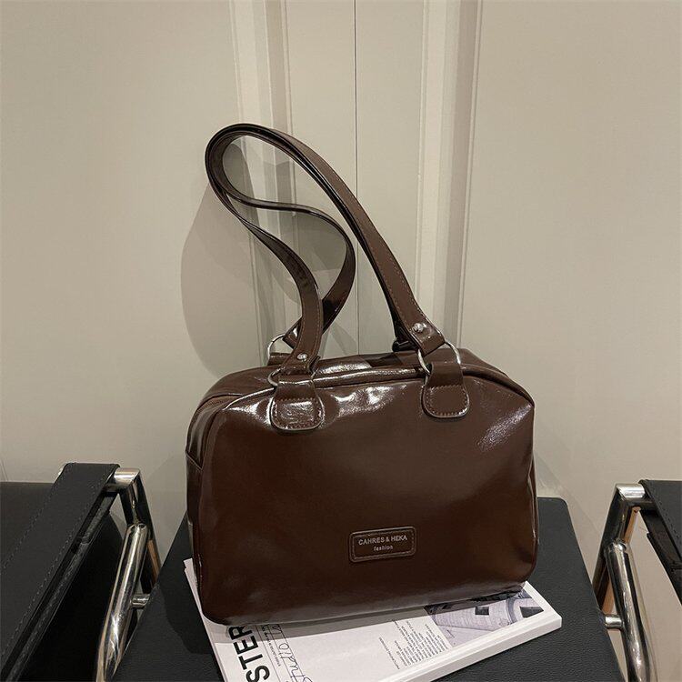 小众复古保龄球包包女式2026新款春夏单肩包高级感纯色手提包