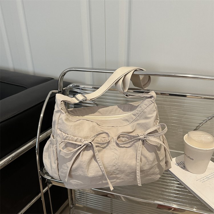 简约尼龙布托特包女2025新款潮蝴蝶结腋下包大容量通勤单肩斜挎包