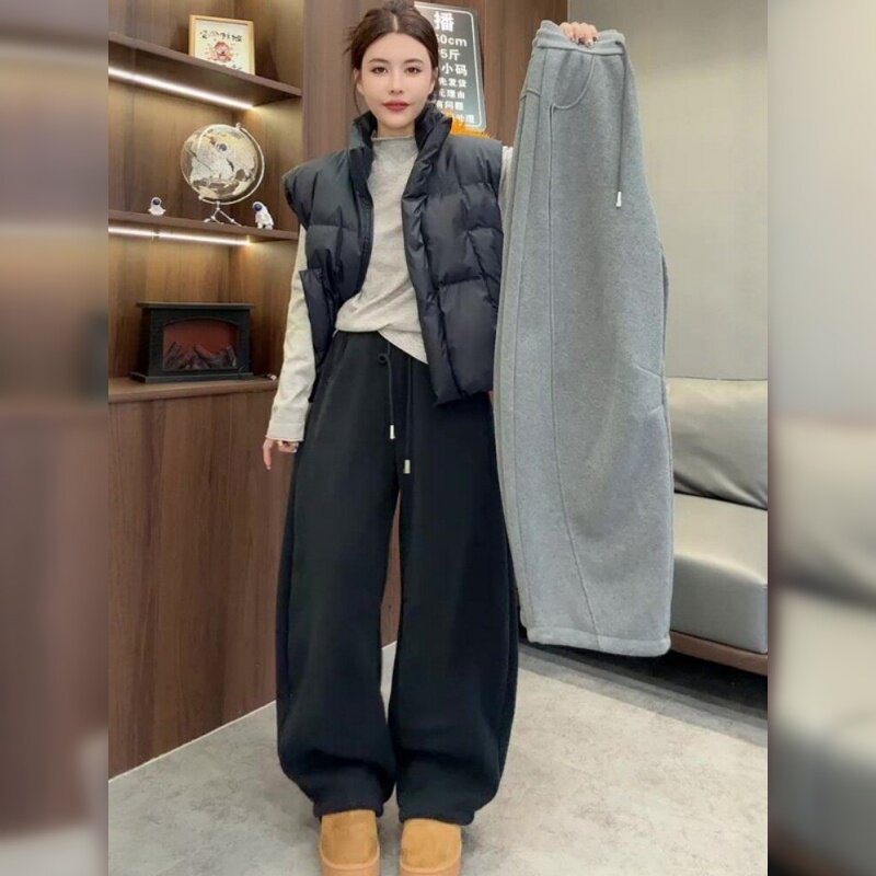 黑色运动阔腿裤女大码裤子2026春秋季新款今年流行爆款弯刀卫裤子