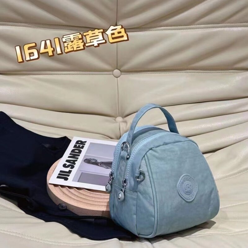 迷你斜挎包女款小号小巧玲珑上档次特小手机包零钱包防水牛津布包
