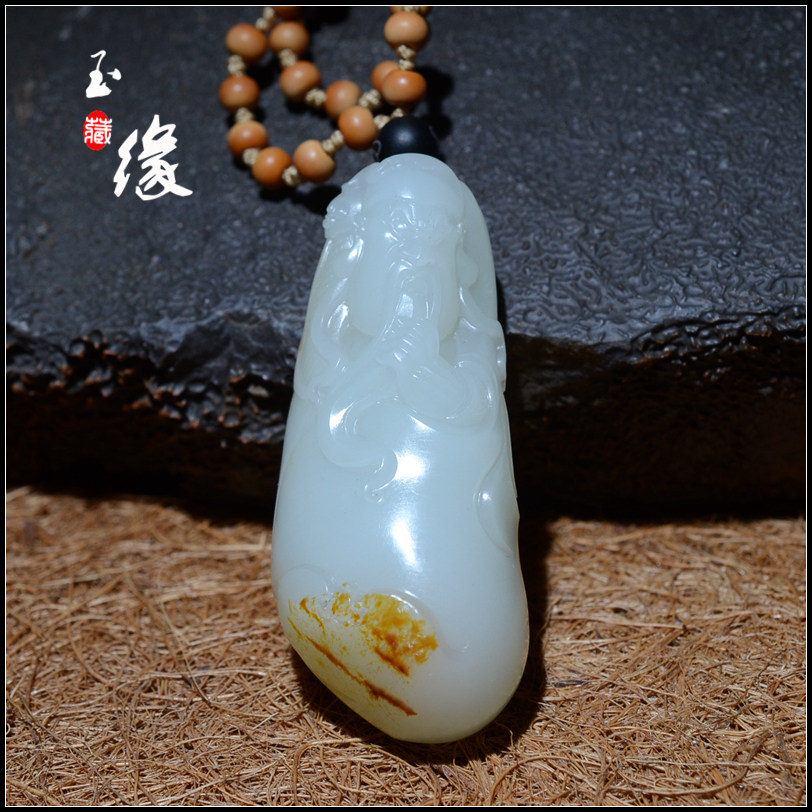 新疆和田玉羊脂洒金红皮独籽关公