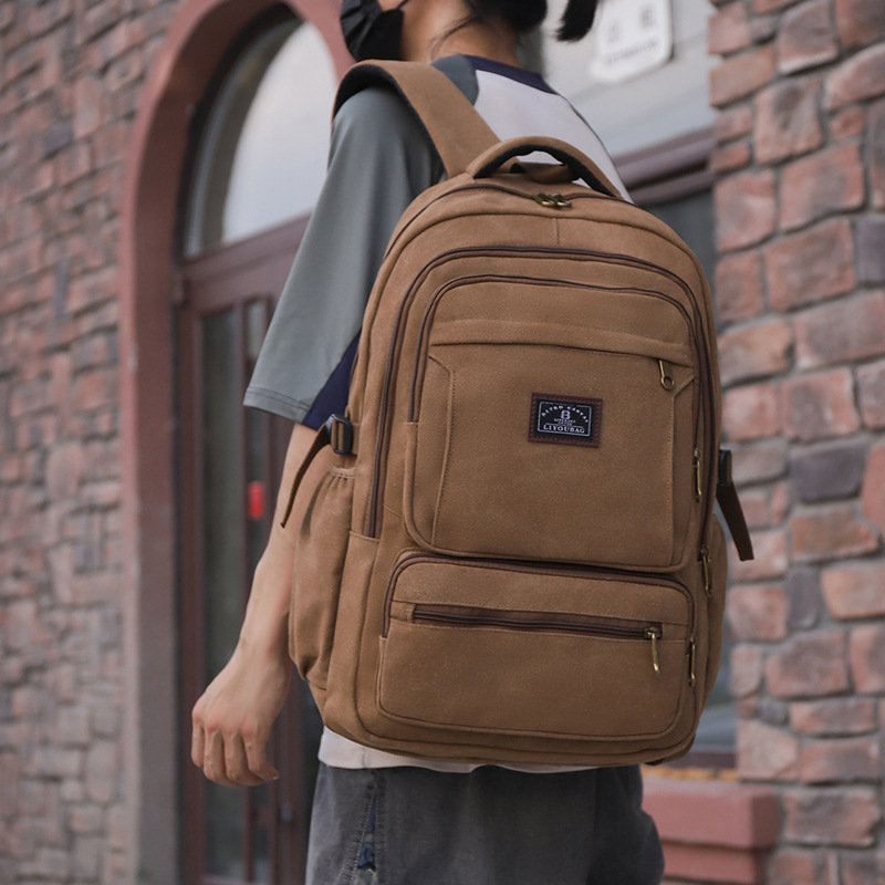 书包帆布双肩包旅行电脑包加厚大容量男士耐磨旅行包复古户外