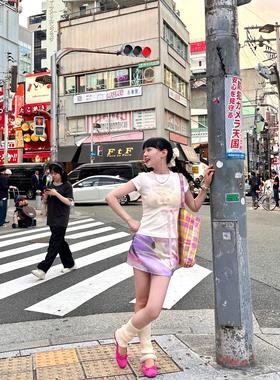 辣妹紫色韵味花卉印花气质包臀短裙夏日度假设计感小众别致半身裙