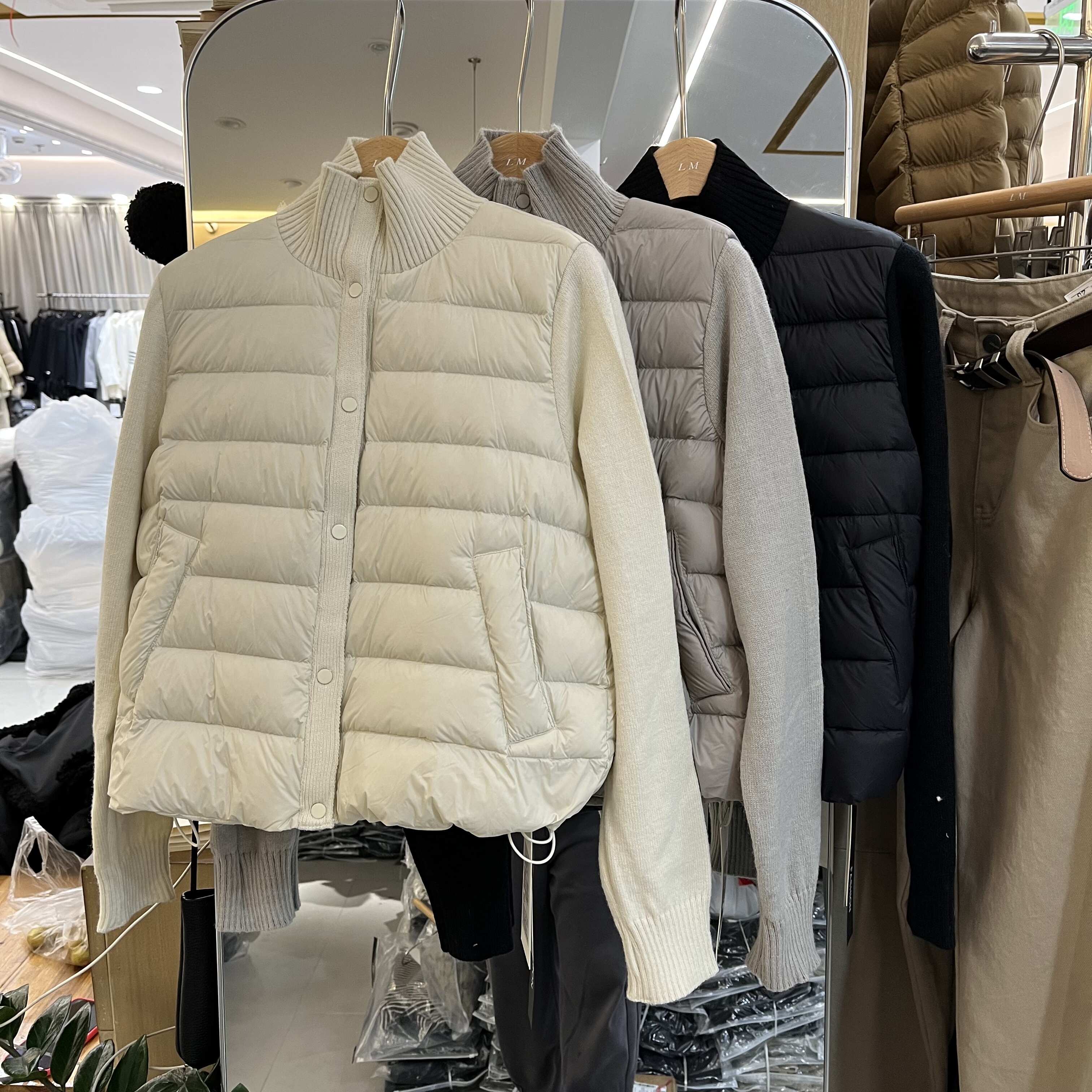 欧洲站2025秋冬新款女士立领一排扣针织袖羽绒服欧货时尚保暖外套