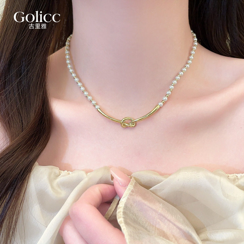 金色珍珠串珠绳结吊坠项链女款颈链高级感轻奢小众2026新款锁骨链