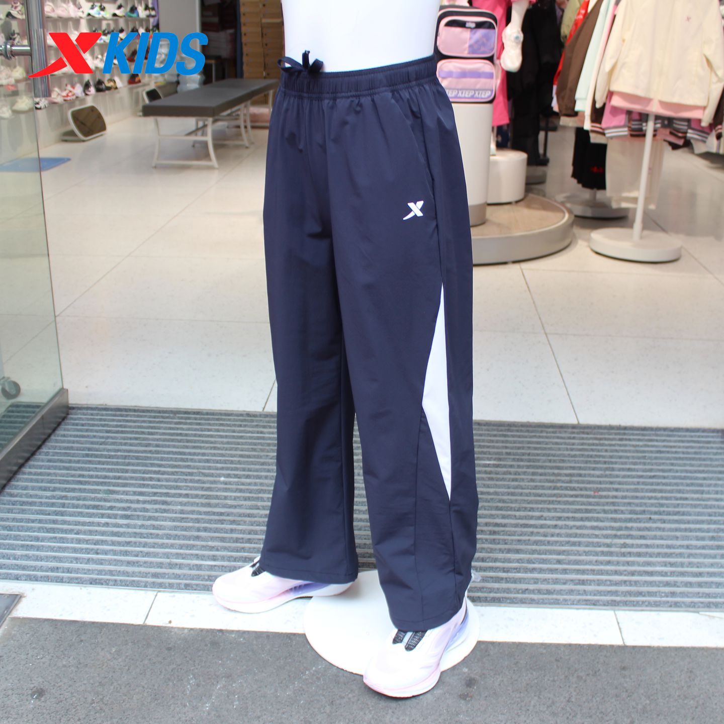 特步女童夏季薄裤子2026夏季新款中大童梭织运动长裤674224664029