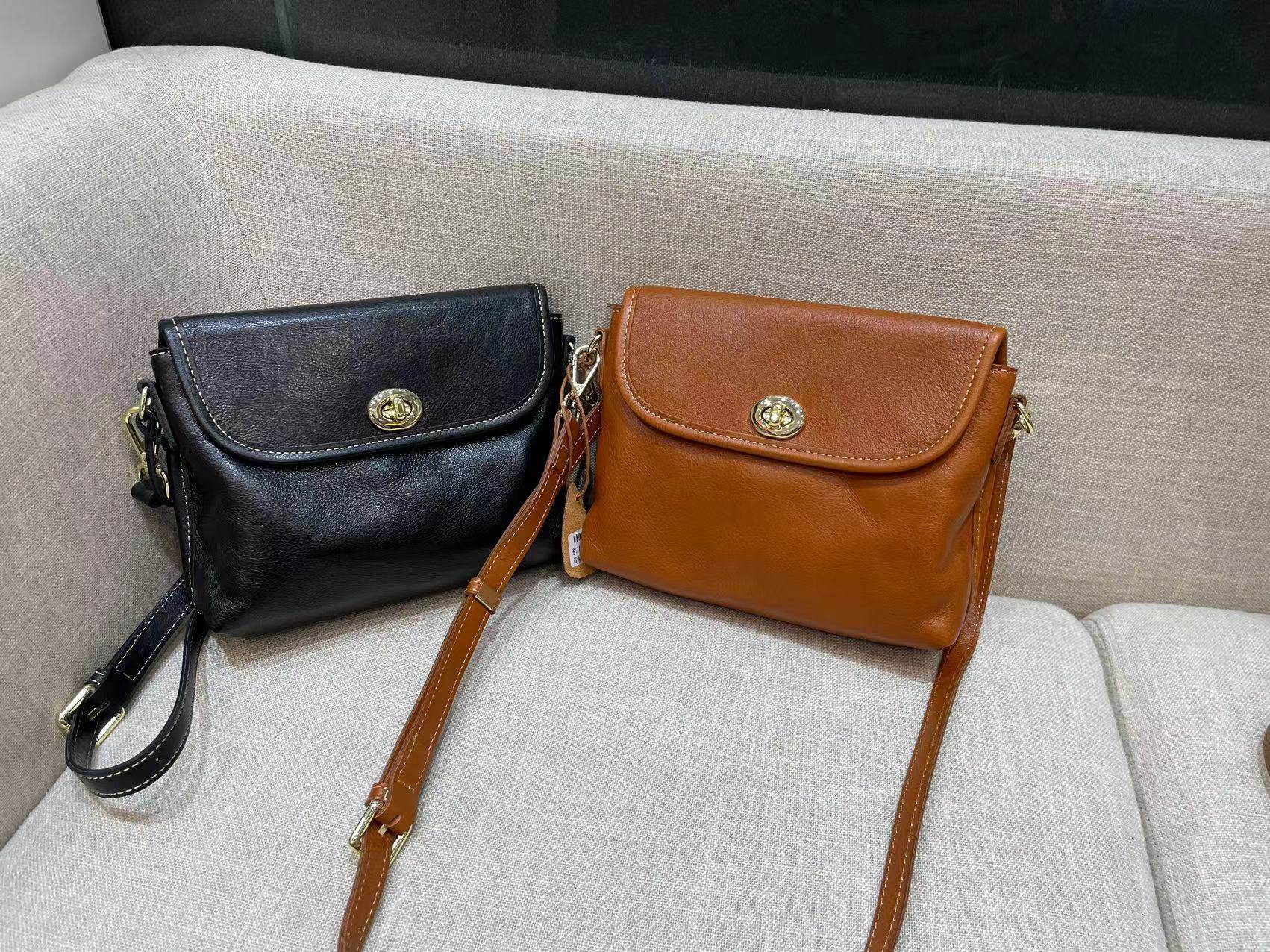 莎娜shanna 纯色牛皮单肩斜跨简单多隔层女款包包