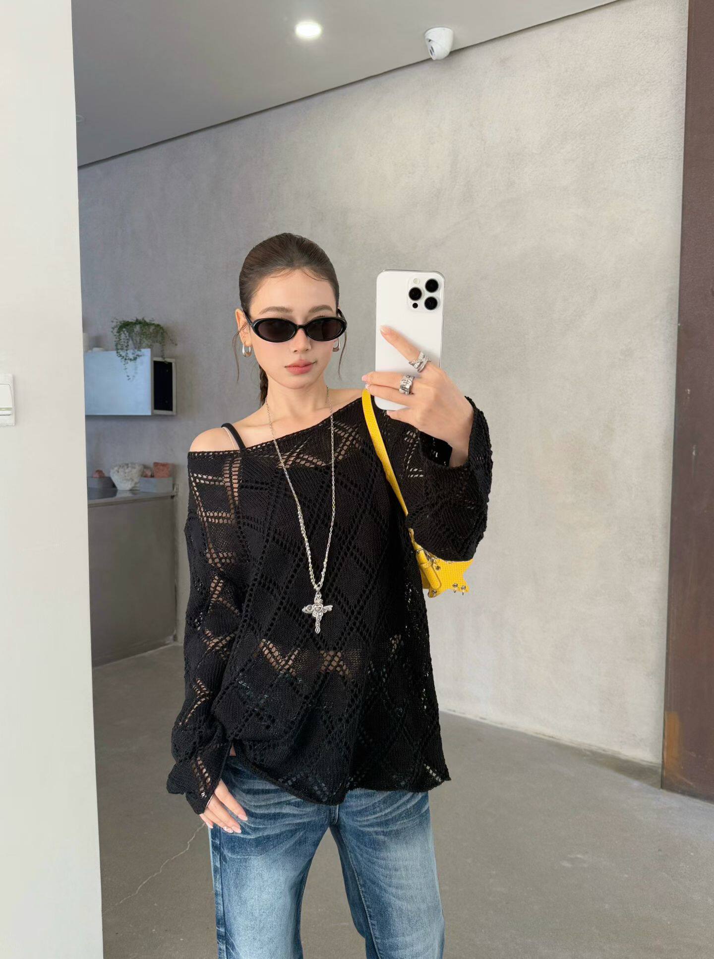 欧洲站2026春新款韩版宽松圆领菱形镂空钩花套头薄款针织衫上衣女