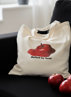 FSK 沙发刺客融化的苹果印花帆布包趣味水果通勤上课手拎布袋