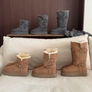 2025高筒羊毛一体厚底骑士靴女款雪地靴金属扣高筒厚底羊毛雪地靴