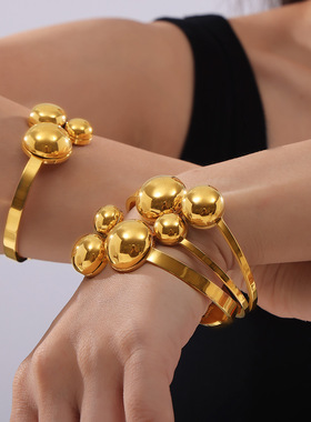 时尚跨境新款钛钢大小圆圈镂空手镯弹簧开口个性设计款轻奢手饰女