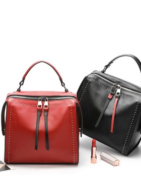 wimi小牛皮新潮女包欧美明星设计师包包手提斜挎柳钉全真皮包2021