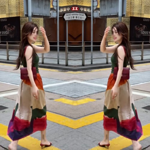 绿色无袖修身打底衫+半裙